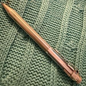 Vintage Caran d'Ache Silvertone 4 color pen. RARE. Needs replacement filters.